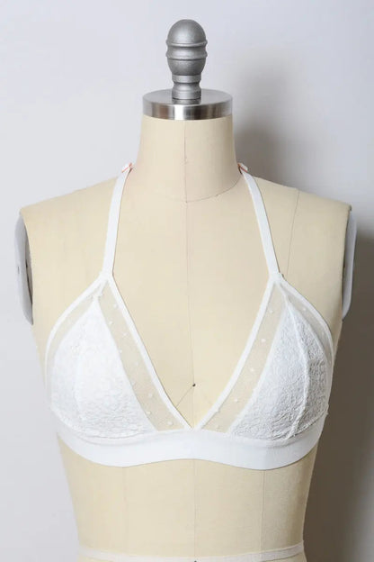 White crochet T-back bralette by Leto Collection featuring intricate lace details and a comfortable fit.