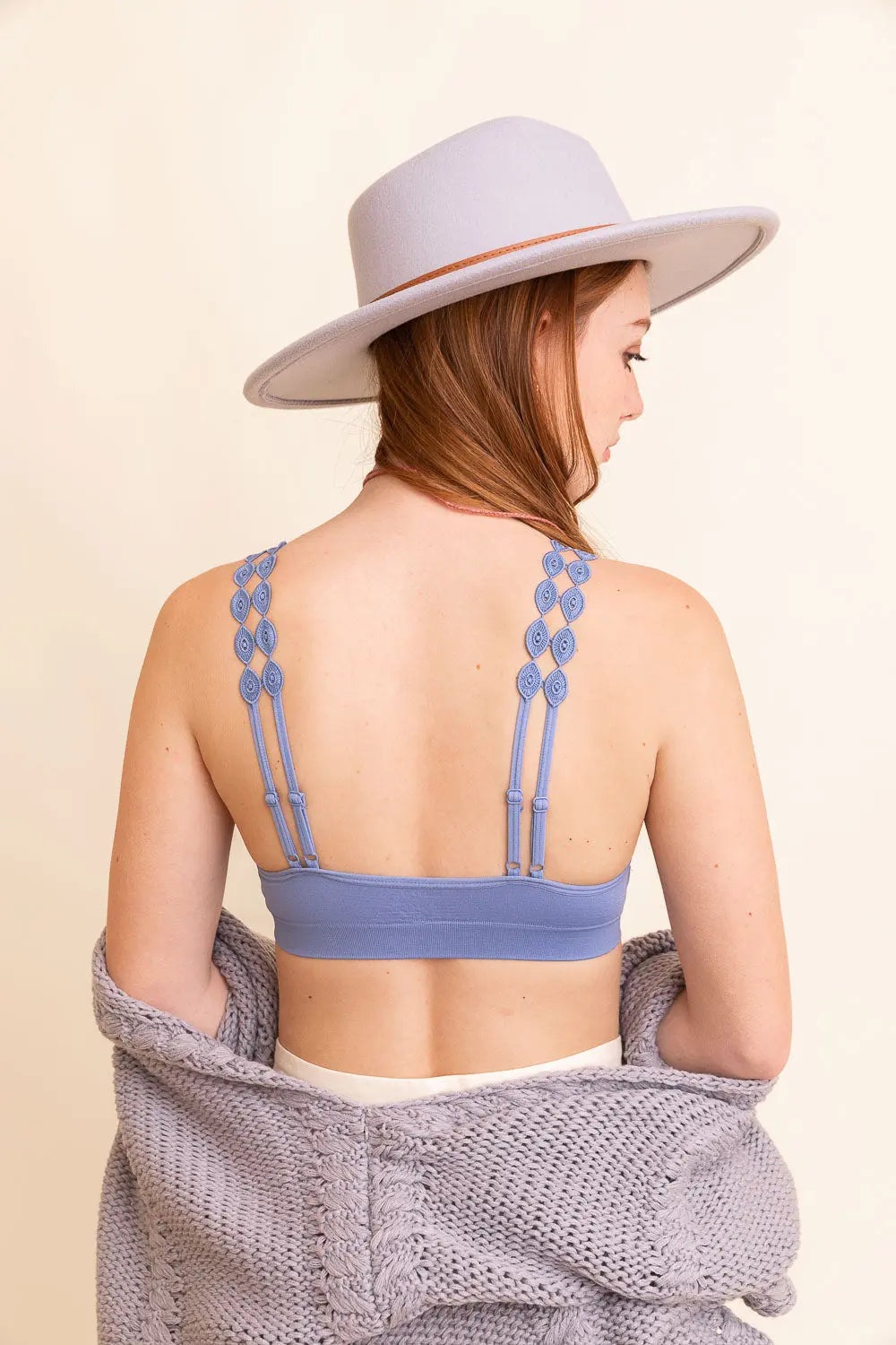 Blue Leto Collection Eye Lace Applique Bralette with intricate lace details and adjustable straps on a white background.
