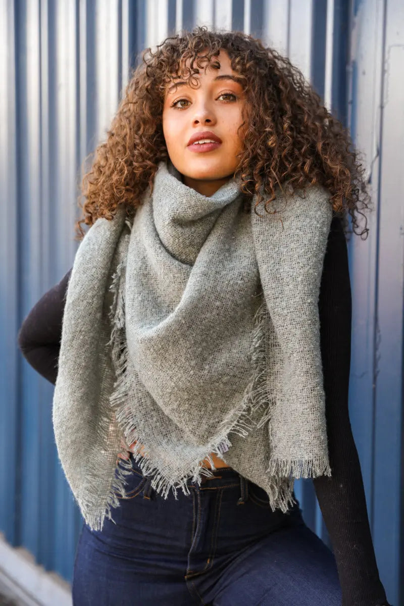 Leto Collection mohair square scarf in sage green, showcasing soft, textured fabric and stylish, versatile design.