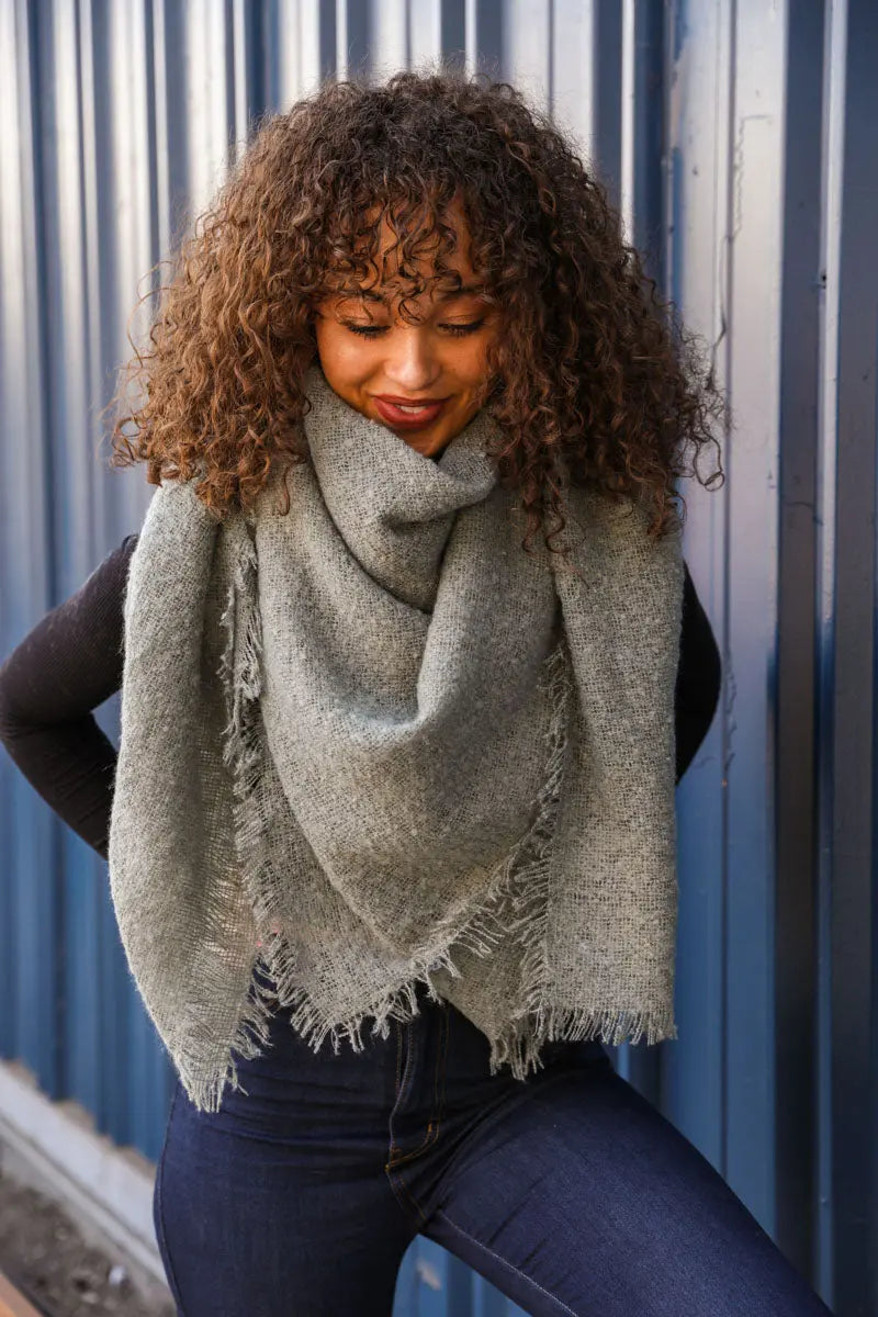 Leto Collection mohair square blanket scarf in sage green with a soft, cozy texture and stylish fringed edges.