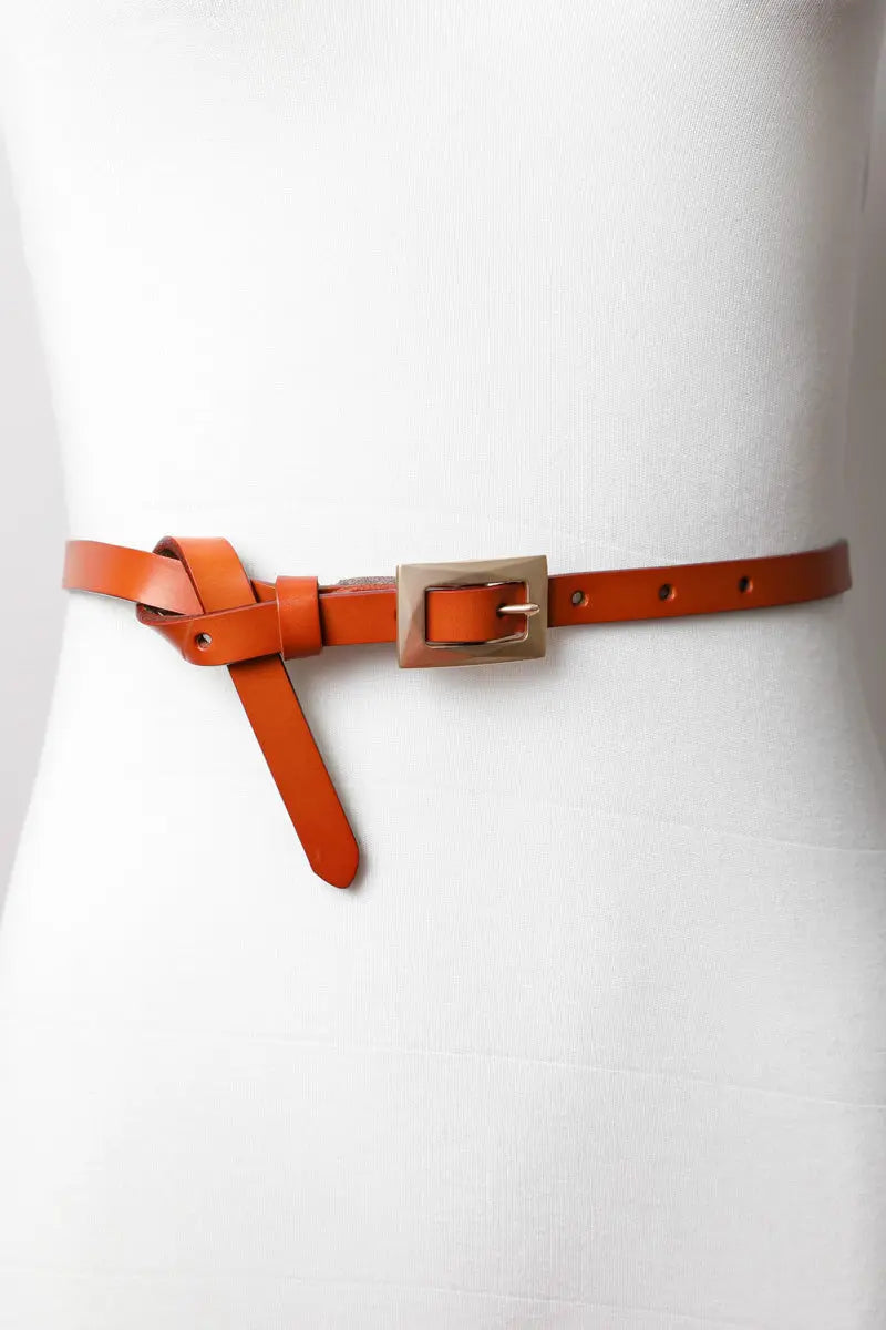Adjustable skinny waist camel belt with sleek gold clasp.