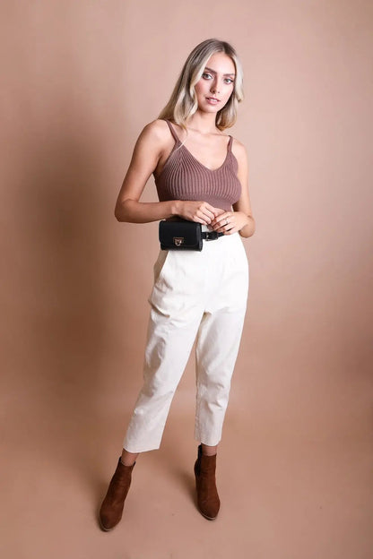 Black small faux leather waist bag for casual and formal use.