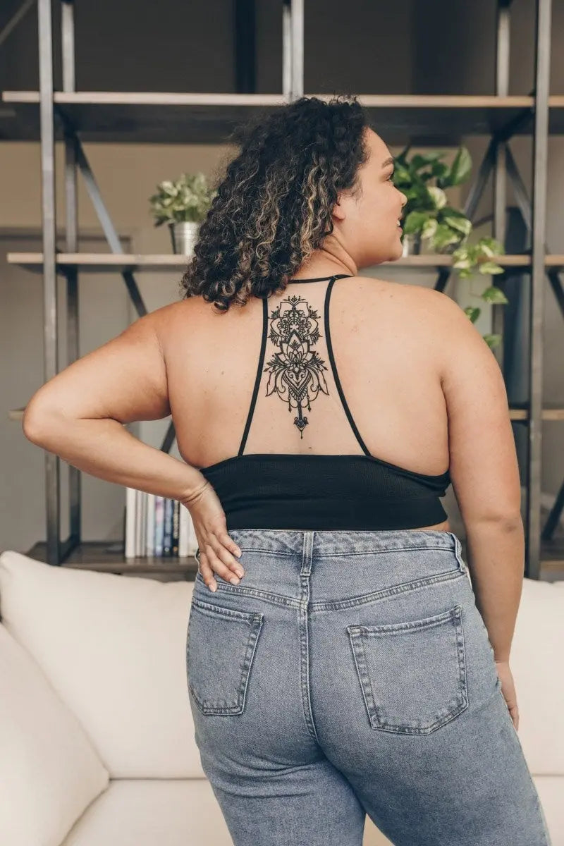 Tattoo back black bralette with racerback and embroidered mesh.